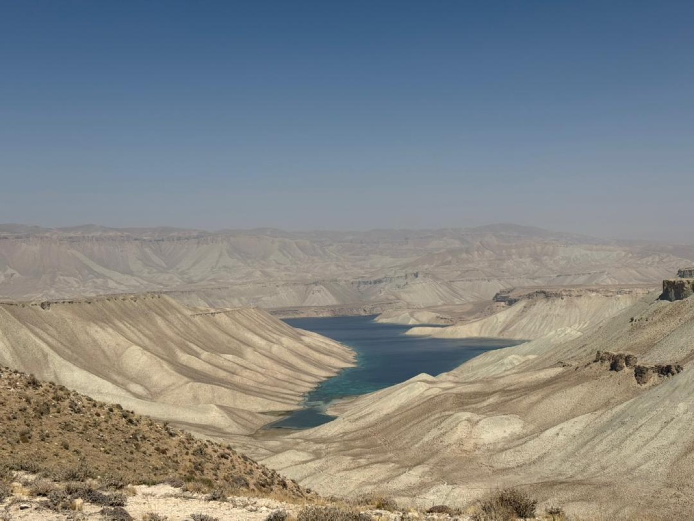 The deep blue lakes of Band-e-Amir set in pale highland cliffs