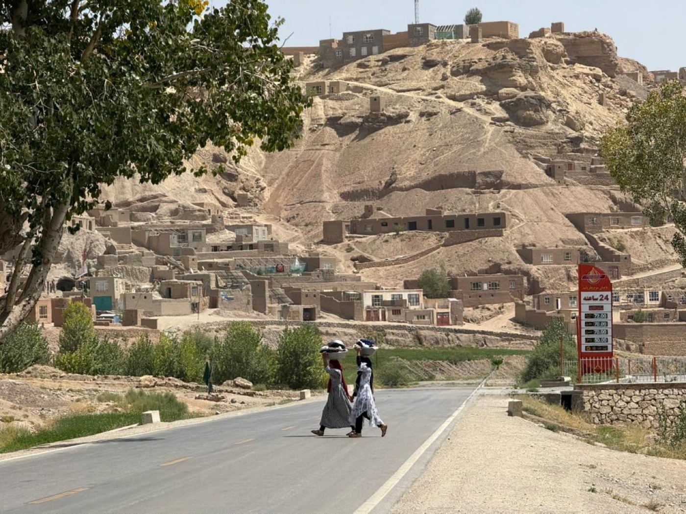 A hillside village beneath the mountains of central Afghanistan